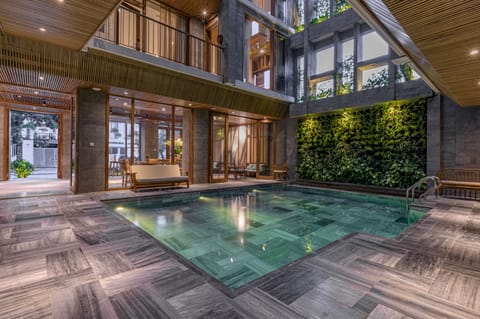 Indoor pool, open 6:00 AM to 11:00 PM, sun loungers