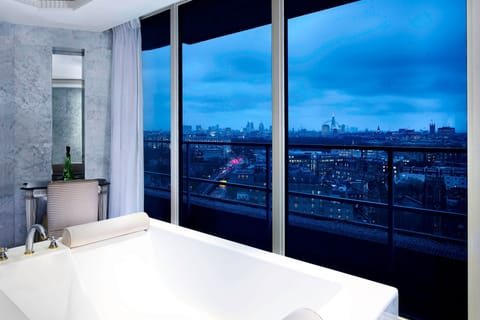Separate tub and shower, eco-friendly toiletries, hair dryer, bathrobes