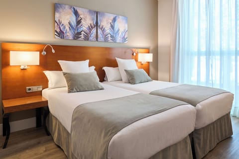 Select Comfort beds, in-room safe, desk, laptop workspace