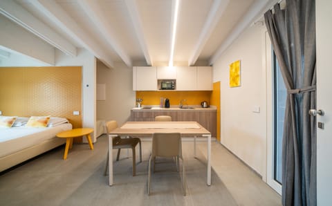 Double or Twin Room, Balcony | Private kitchen | Fridge, stovetop, electric kettle, highchair