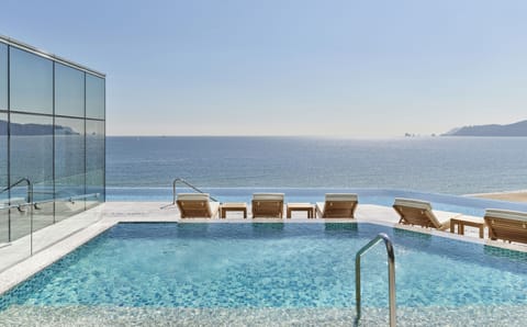 Indoor pool, outdoor pool, open 6:00 AM to 10:00 PM, sun loungers
