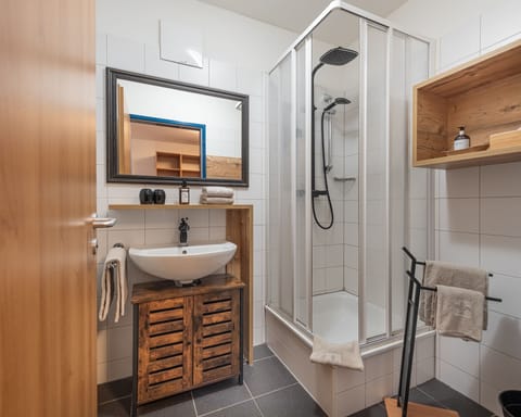 Shower, free toiletries, hair dryer, towels