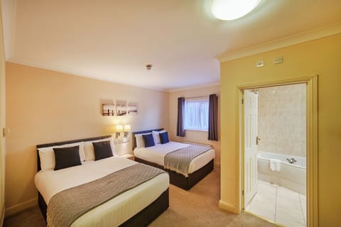 Superior Family Room | Desk, laptop workspace, blackout drapes, iron/ironing board