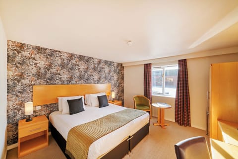 Desk, laptop workspace, blackout drapes, iron/ironing board