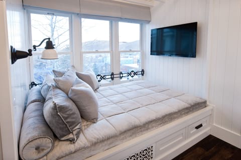 Premium bedding, down comforters, pillowtop beds, in-room safe