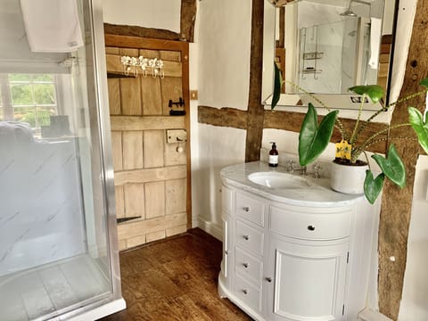 Deluxe Double Room | Bathroom | Shower, designer toiletries, hair dryer, bathrobes