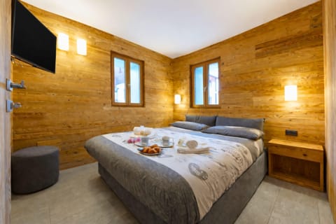Family Apartment, 1 Bedroom, Microwave (Marlies Ski in - Ski out 50m) | 1 bedroom, WiFi, bed sheets