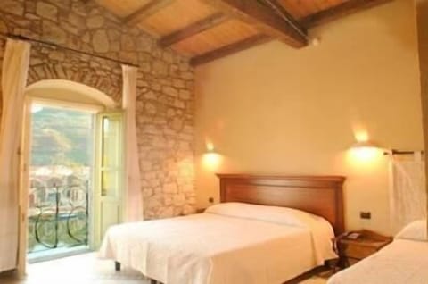 Superior Triple Room, River View | In-room safe, individually decorated, individually furnished, desk