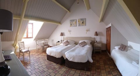 Superior Triple Room | Minibar, in-room safe, desk, iron/ironing board