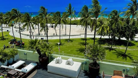 On the beach, sun loungers, beach towels