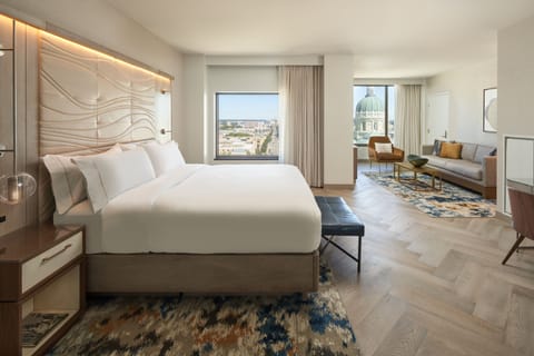 Premium bedding, down comforters, pillowtop beds, in-room safe