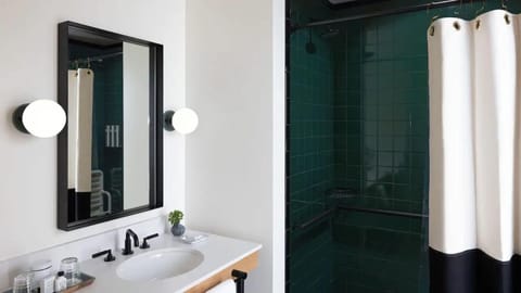 Shower, designer toiletries, hair dryer, bathrobes