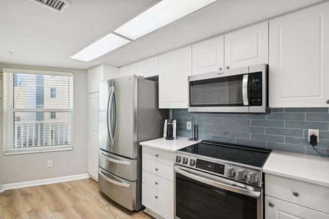 Condo, 2 Bedrooms | Private kitchen | Fridge, coffee/tea maker, toaster, cookware/dishes/utensils