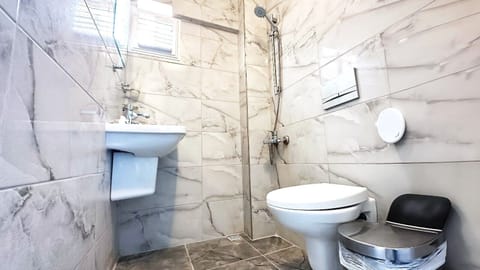 Shower, towels, soap, shampoo