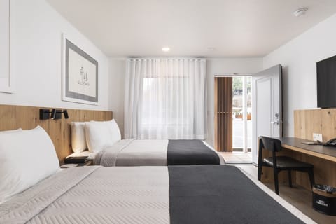 Room, 2 Queen Beds | Individually decorated, individually furnished, desk, laptop workspace