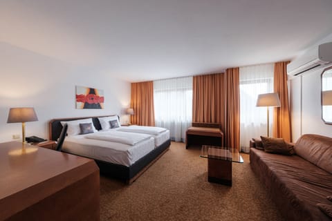 Minibar, desk, laptop workspace, blackout drapes