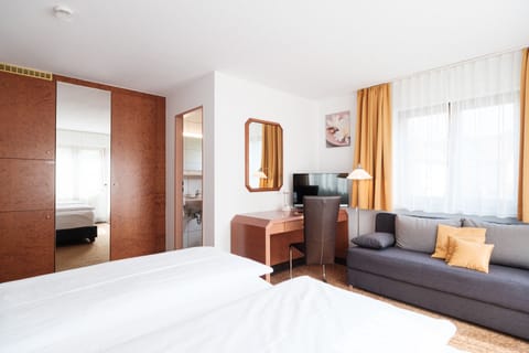 Comfort Triple Room, 1 Double Bed with Sofa bed | Minibar, desk, laptop workspace, blackout drapes