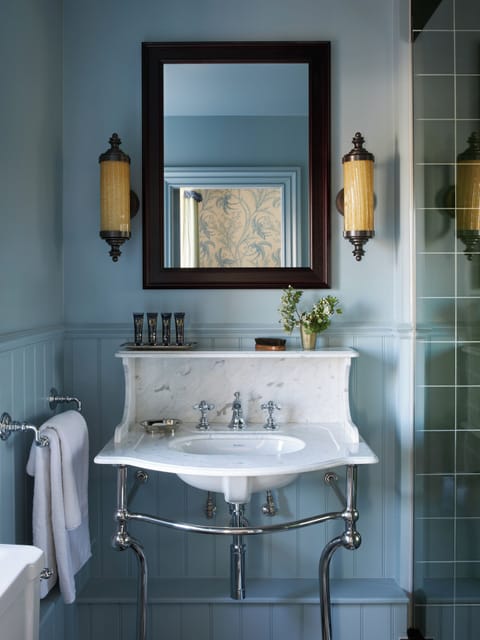 Designer toiletries, hair dryer, bathrobes, towels