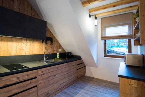 Mini-fridge, coffee/tea maker, electric kettle, cookware/dishes/utensils