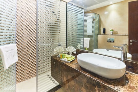 Shower, free toiletries, hair dryer, bathrobes