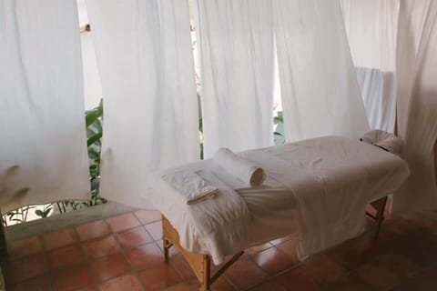 Outdoor treatment areas, deep-tissue massages, Swedish massages