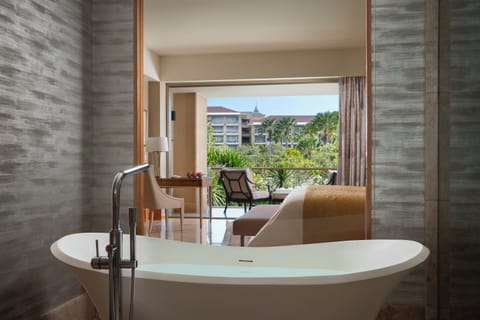 Signature Room (Mulia Signature) | Bathroom | Separate tub and shower, deep soaking tub, rainfall showerhead
