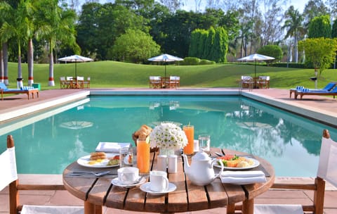 Outdoor pool, open 8:00 AM to 7:00 PM, sun loungers