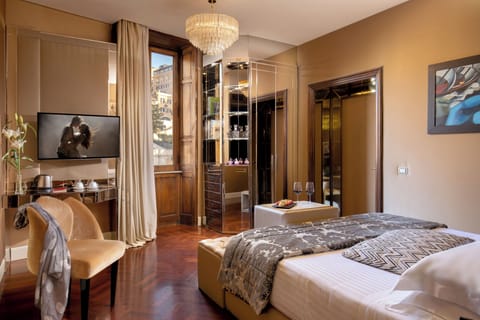 Premium bedding, down comforters, pillowtop beds, minibar