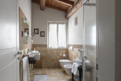 Deluxe Apartment, 1 Bedroom, Hill View (La Terrazza) | Bathroom | Shower, hair dryer, children's robes, bidet