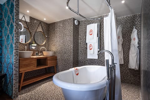 Shower, free toiletries, hair dryer, bathrobes