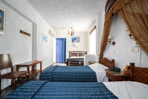 Quadruple Room | In-room safe, desk, soundproofing, iron/ironing board