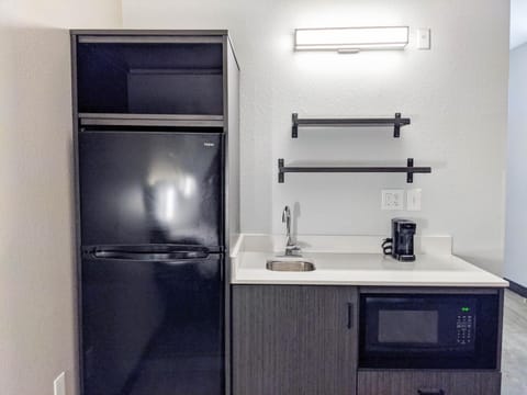 Fridge, microwave, coffee/tea maker, toaster