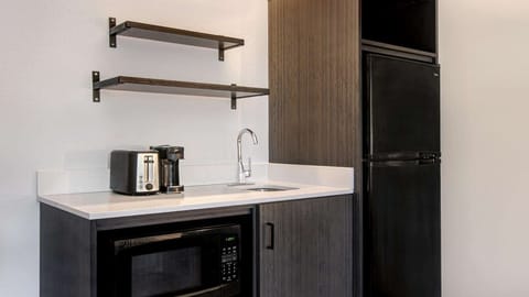 Fridge, microwave, coffee/tea maker, toaster