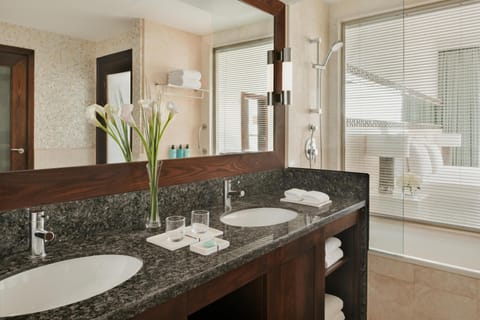 Family Suite, 1 Bedroom, Balcony (Ain Dubai View-Coral Lounge Access) | Bathroom | Combined shower/tub, deep soaking tub, eco-friendly toiletries