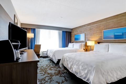 Hypo-allergenic bedding available, down comforters, in-room safe, desk