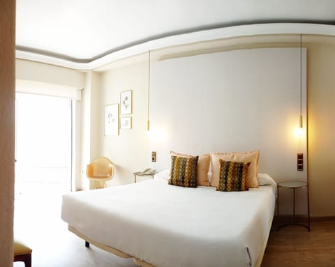 Superior Double Room | Minibar, in-room safe, desk, laptop workspace