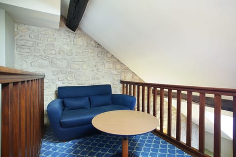 Duplex Room | Living area | Flat-screen TV