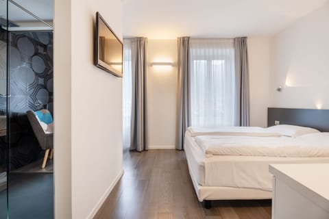 Deluxe Double Room | Minibar, in-room safe, cribs/infant beds, free WiFi