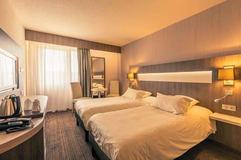Premium bedding, pillowtop beds, minibar, in-room safe