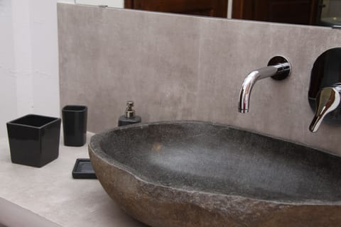 Shower, free toiletries, hair dryer, slippers