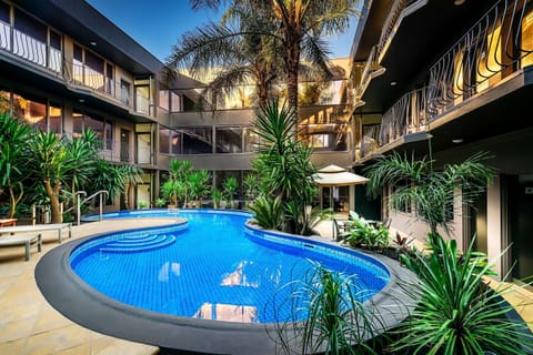 Outdoor pool, pool umbrellas, sun loungers