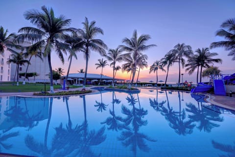 Outdoor pool, open 8:00 AM to 8:00 PM, pool umbrellas, sun loungers