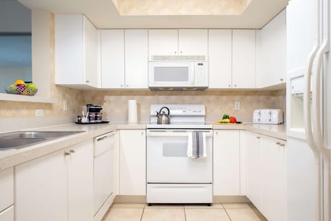 Fridge, microwave, coffee/tea maker, paper towels