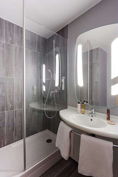 Eco-friendly toiletries, hair dryer, towels