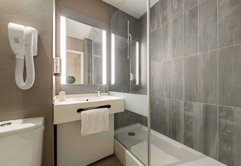 Shower, eco-friendly toiletries, hair dryer, towels