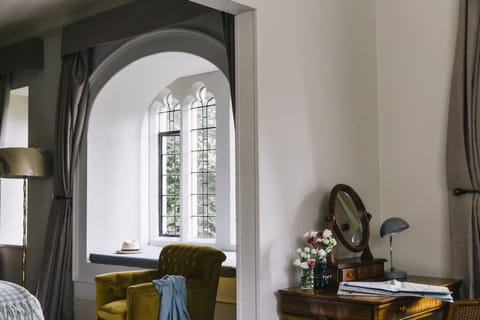 Executive Suite, 1 Bedroom | Individually decorated, desk, iron/ironing board, free WiFi