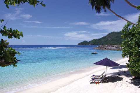 Deluxe Room, 1 King Bed, Ocean View | Beach | Private beach, white sand, sun loungers, beach umbrellas