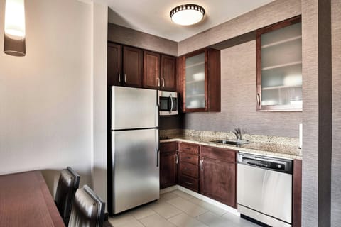 Suite, 1 Bedroom | Private kitchen | Fridge, microwave, stovetop, dishwasher