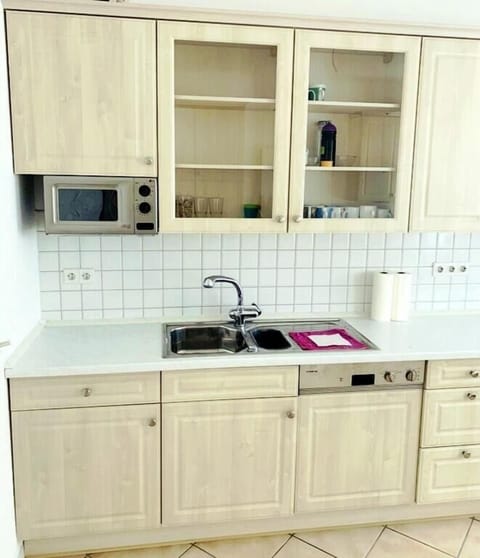 Fridge, stovetop, coffee/tea maker, cookware/dishes/utensils