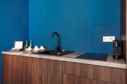 Deluxe Apartment, 1 Bedroom | Private kitchen | Mini-fridge, coffee/tea maker, electric kettle, spices